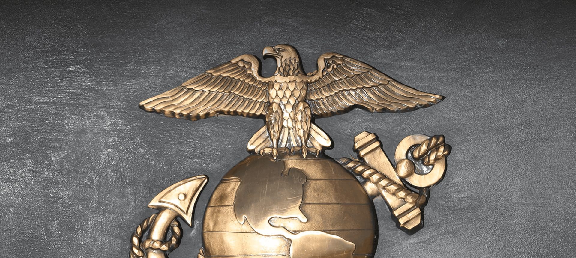 Bronze Marine Corps eagle, globe and anchor emblem